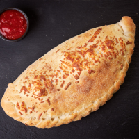 Pizza Calzone Pizza cu blat normal la Quick Bites din Târgu Mureş